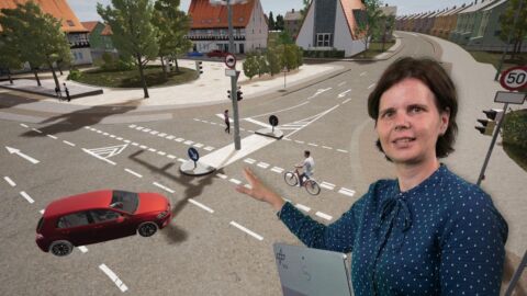 Frau präsentiert Verkehrssituation auf Bildschirm